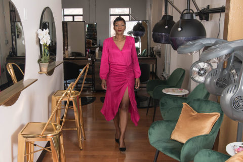 Nikita montgomery in a pink dress walking