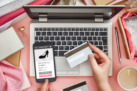 person buying shoes with credit card