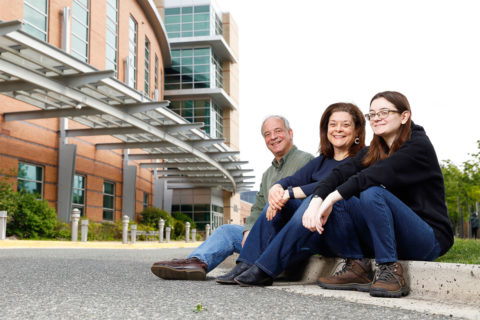 The Roepe family in front of school