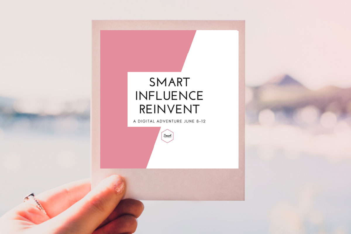 pink sign saying smart influence reivent