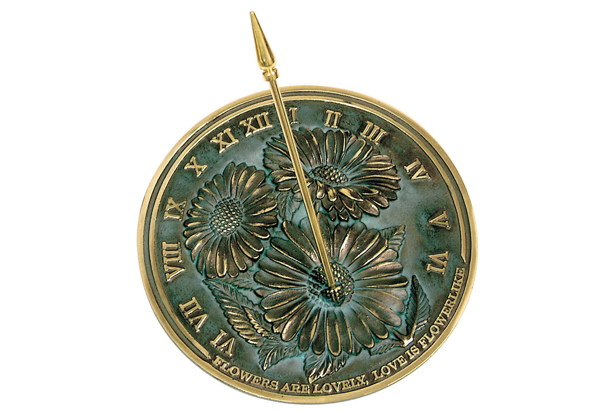 gold sun dial with roman numerals