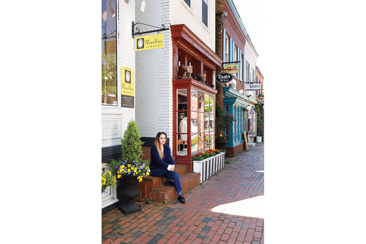 old town alexandria business owner sitting on steps in front of wear ever jewelry