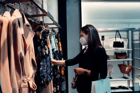 woman shopping at store with mask on