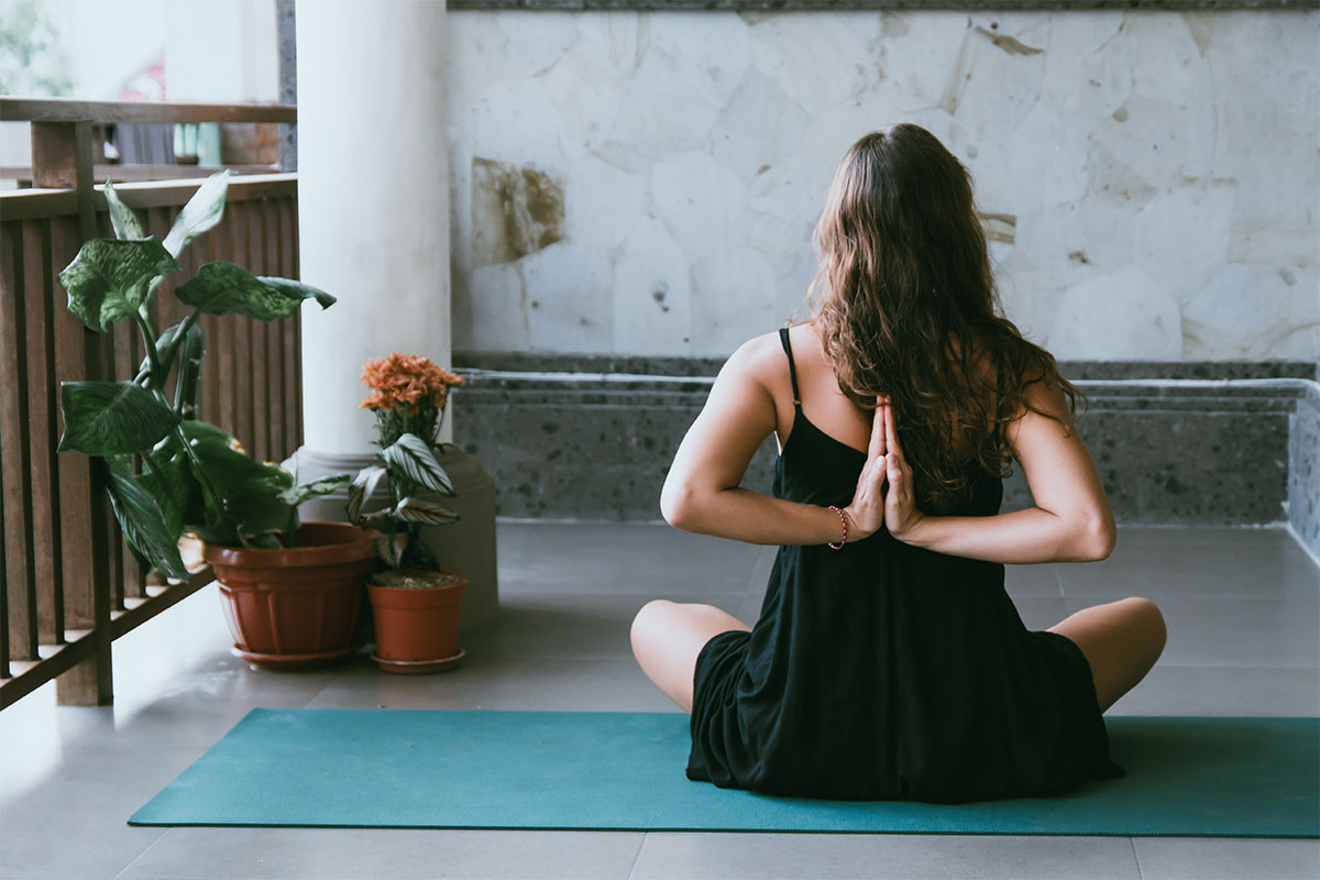 woman holding a yoga position