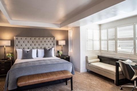 blue bedroom in hotel room