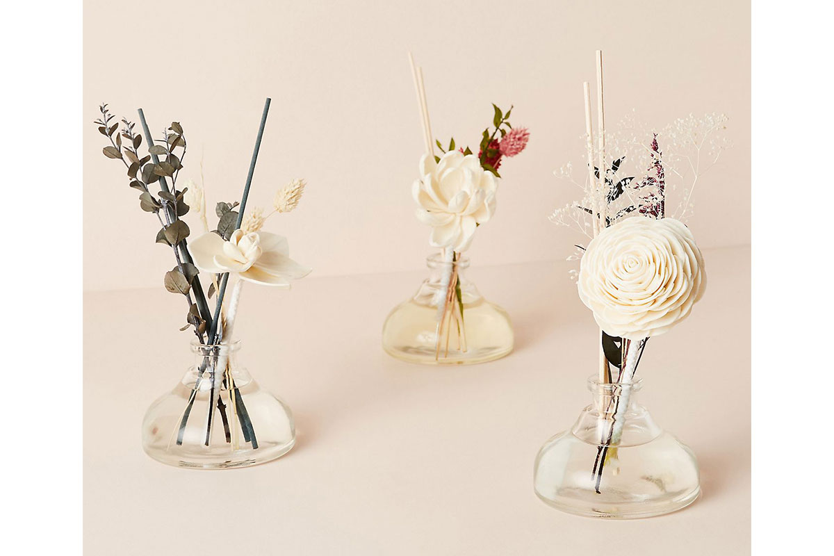 three floral inscent diffusers 