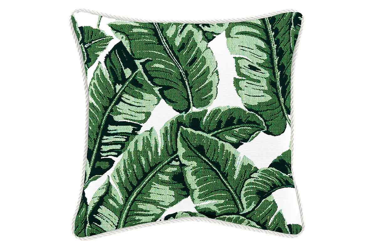 Outdoor pillow with green leaves