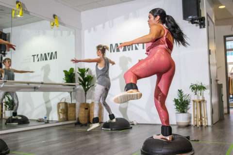 people working out on bosu balls
