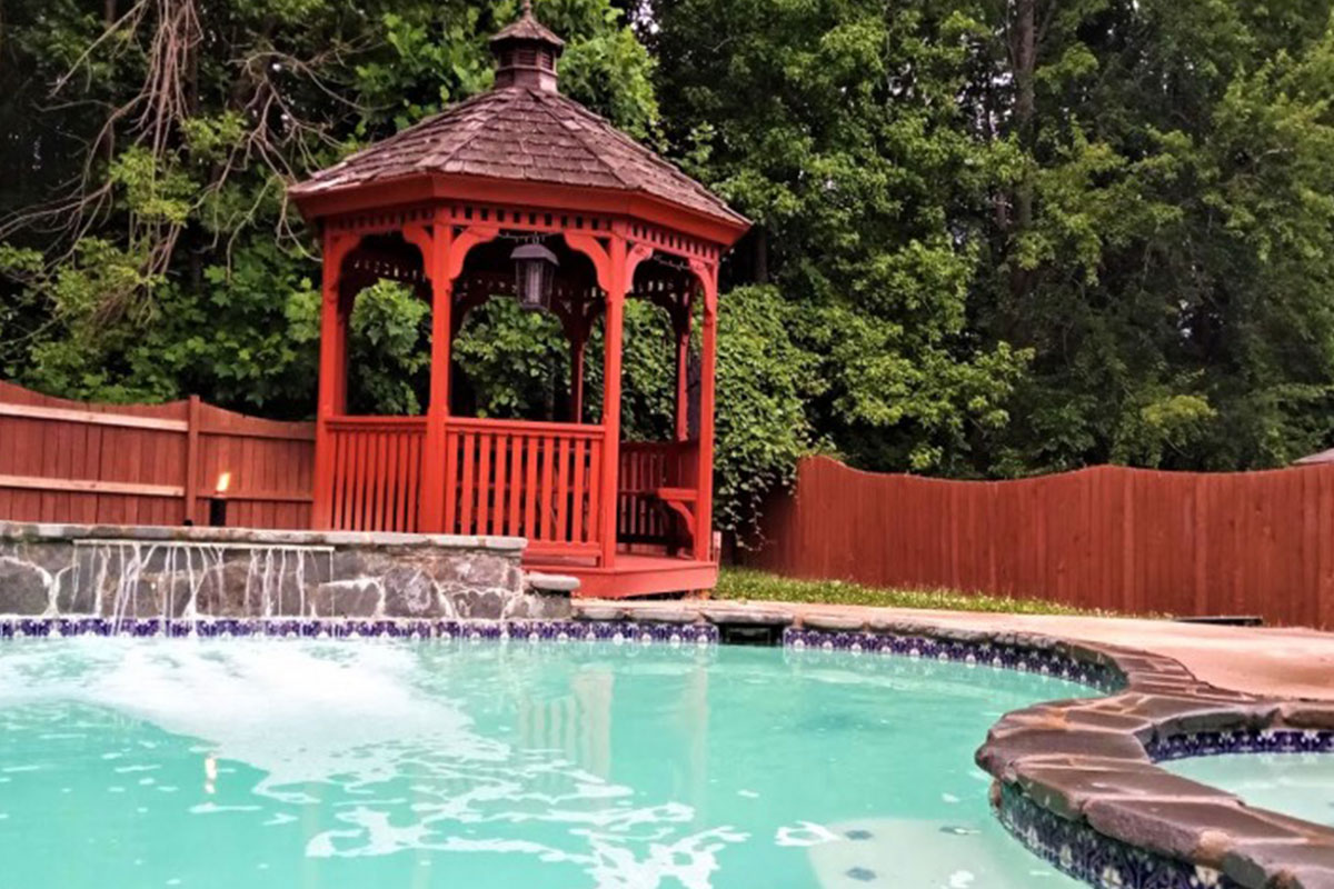 pool with red gazebo