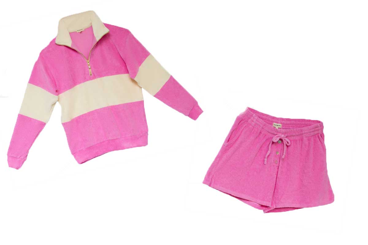 pink sweatshirt with half zipper and pink shorts