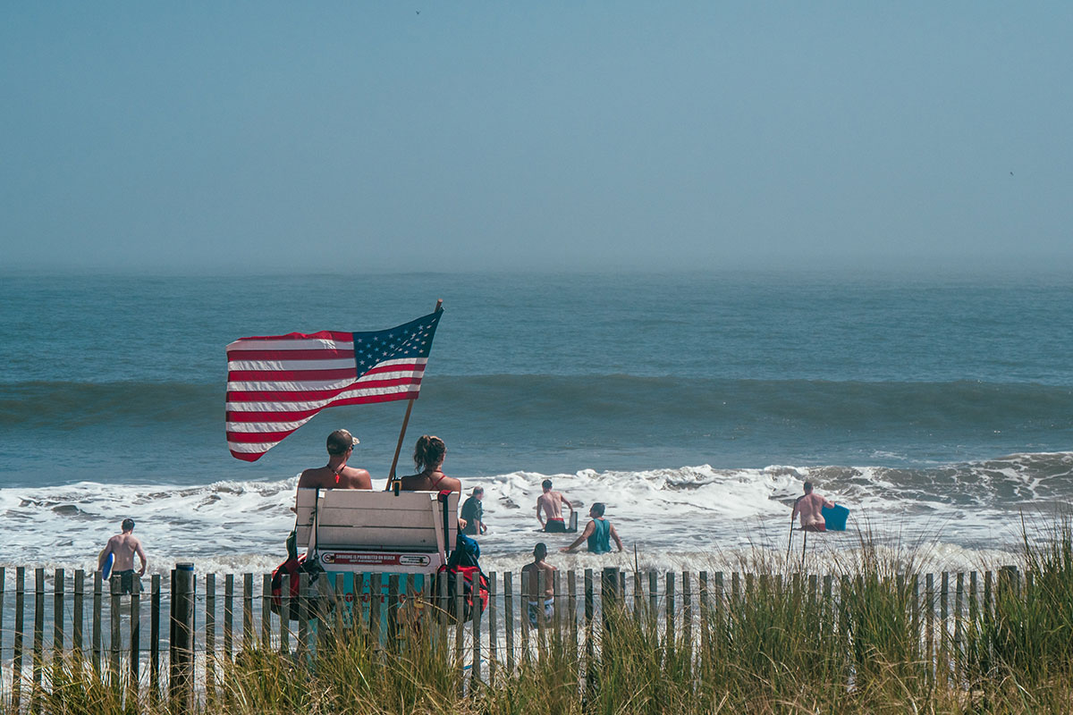 american flag on beach