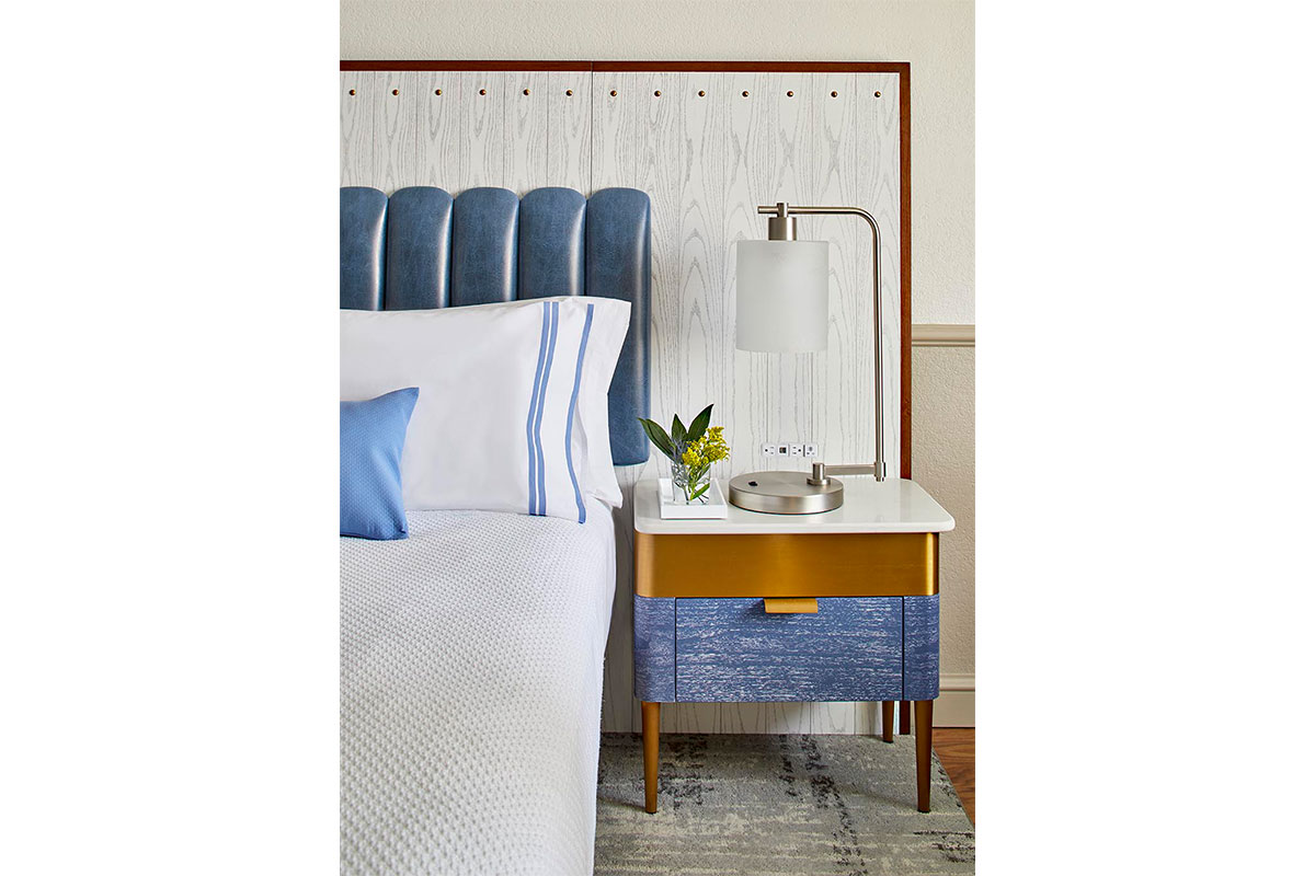 blue and white themed hotel bedroom