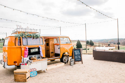 orange booth in front of vineyard