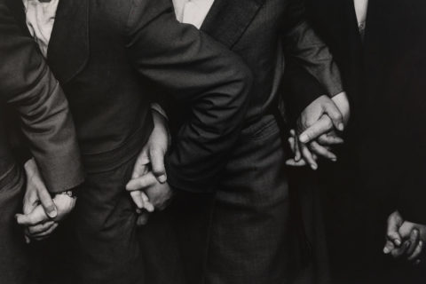 men holding hands