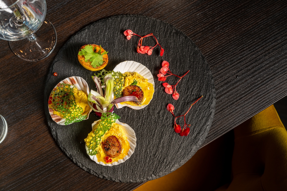 The Seashell Scallops entice diners with their visual appeal at Celebration by Rupa Vira.