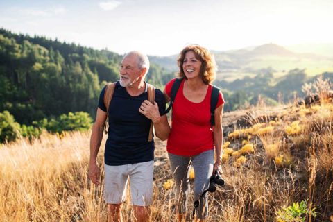 man and woman hiking