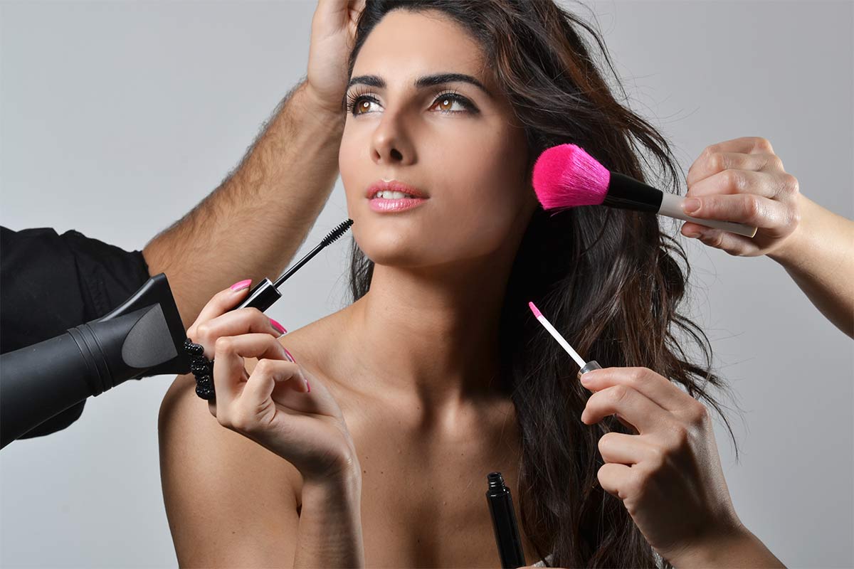 woman having hair and make up done