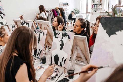 Group of women painting