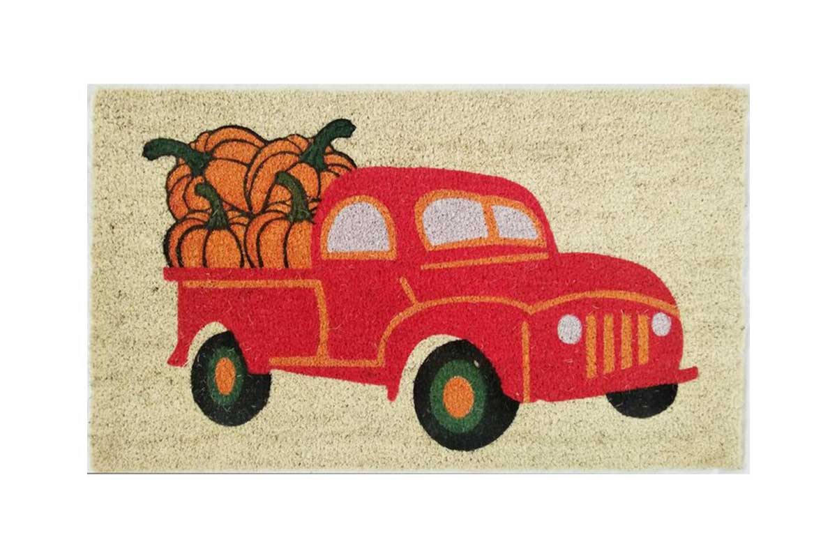 red truck with pumpkins mat