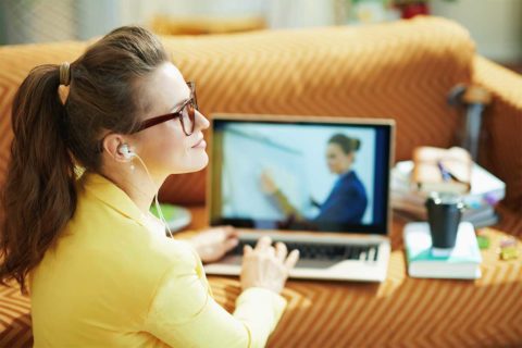 woman watching computer
