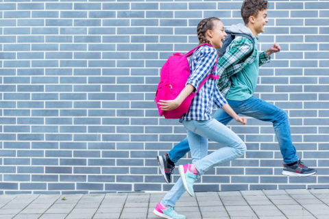 children running to school
