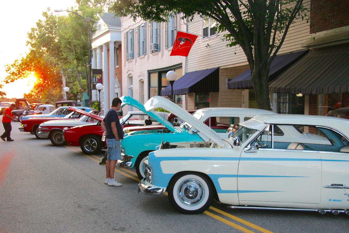 classic cars parked along street