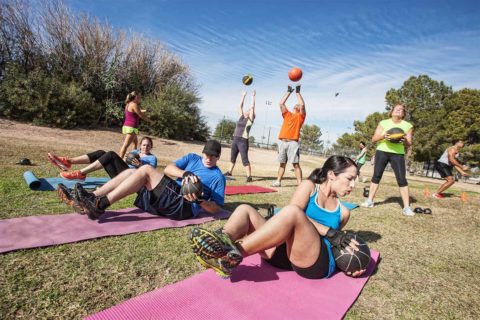 people working out in bootcamp class