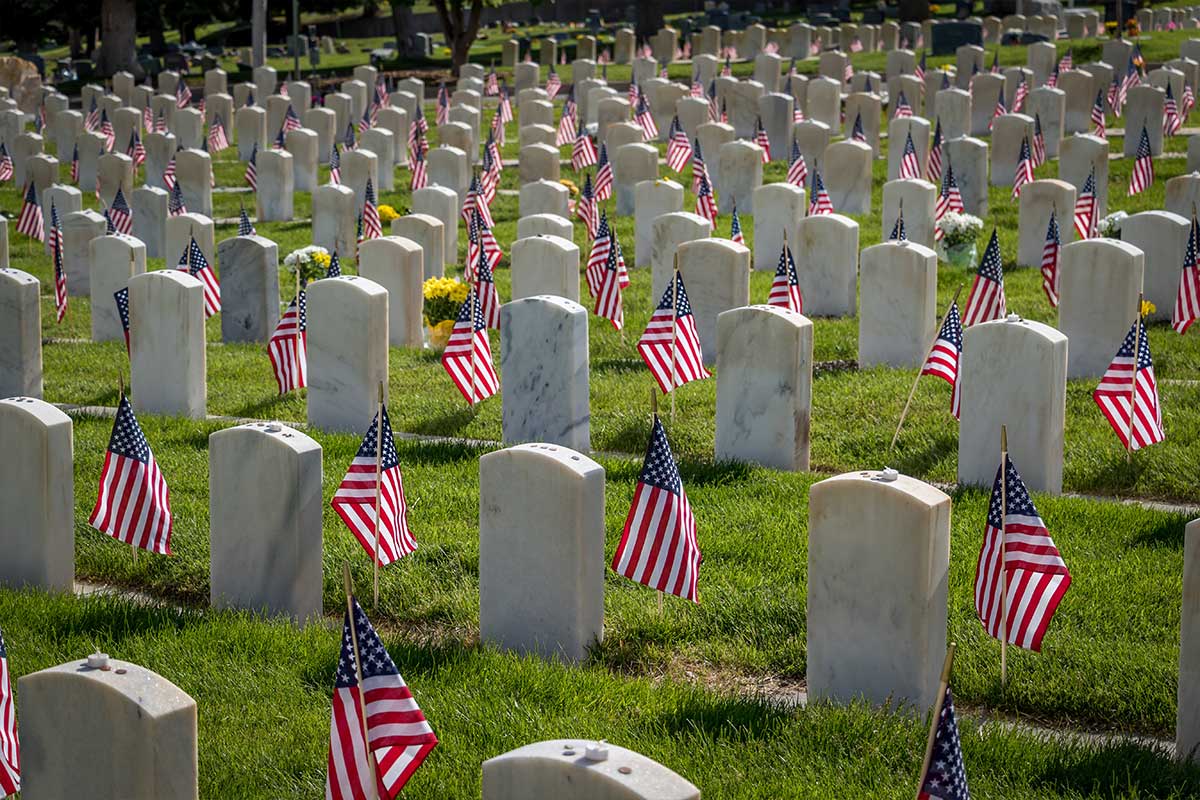 grave stones with flags