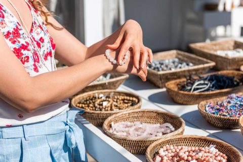 girl holding jewelry