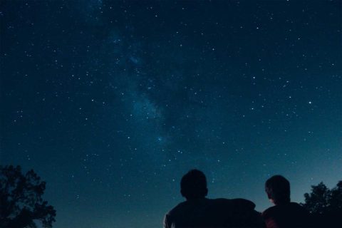 people looking at stars
