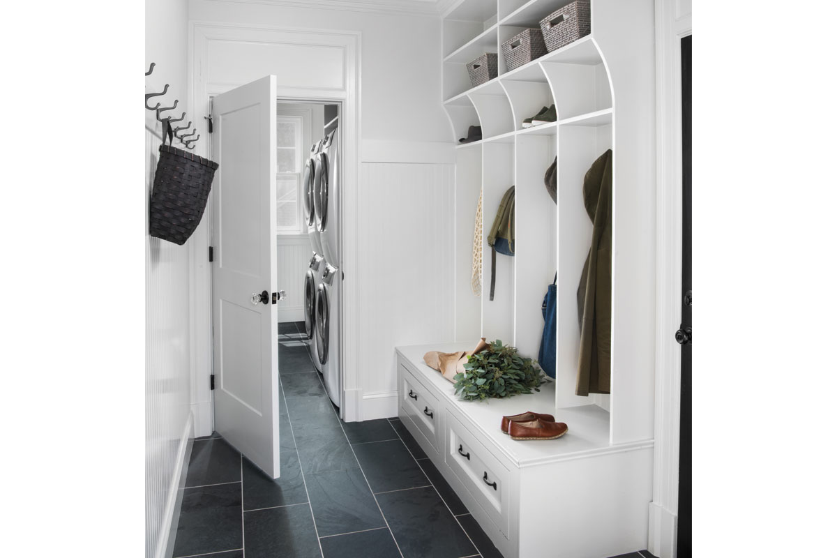 white mudroom with cubbies