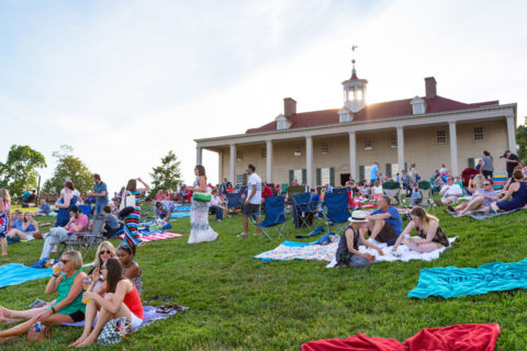 people sitting outside at mount vernon
