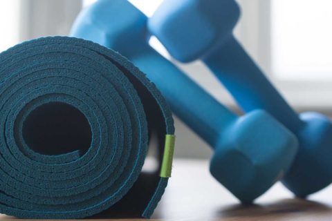 dumbells and yoga mat