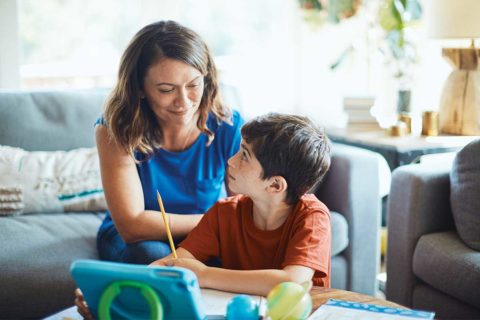 mom and son doing homework