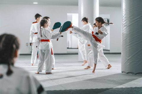 children practicing taekwondo