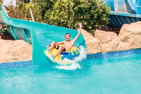 kid on water slide