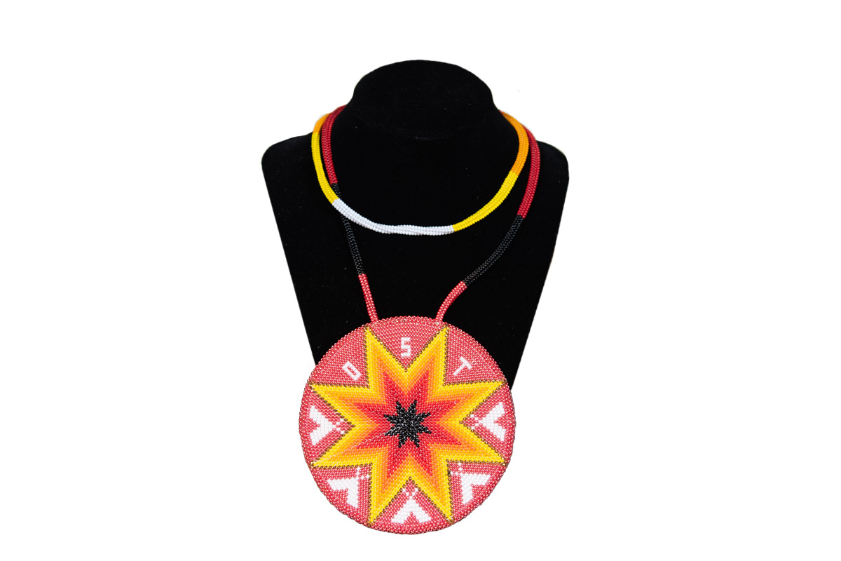 red and yellow beadded medallion