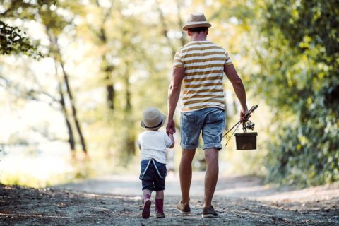 father and son with fishing pole