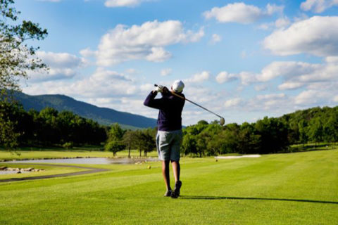 man golfing