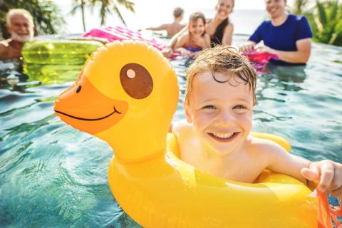 family in pool