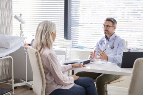 doctor talking to patient