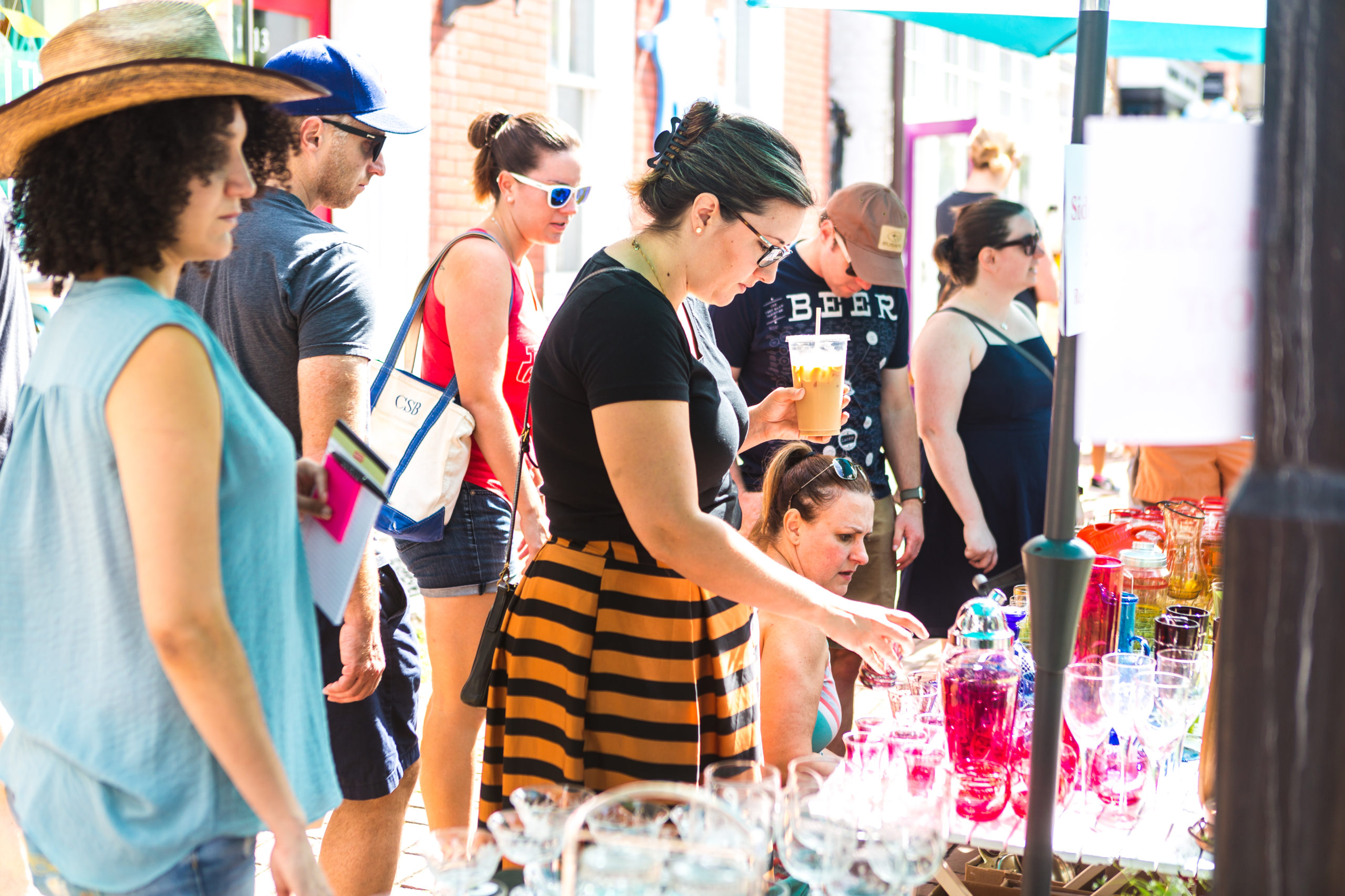 People shop for items at the Alexandria Sidewalk Sale