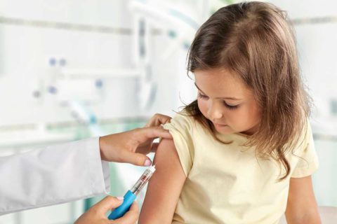 child getting vaccine
