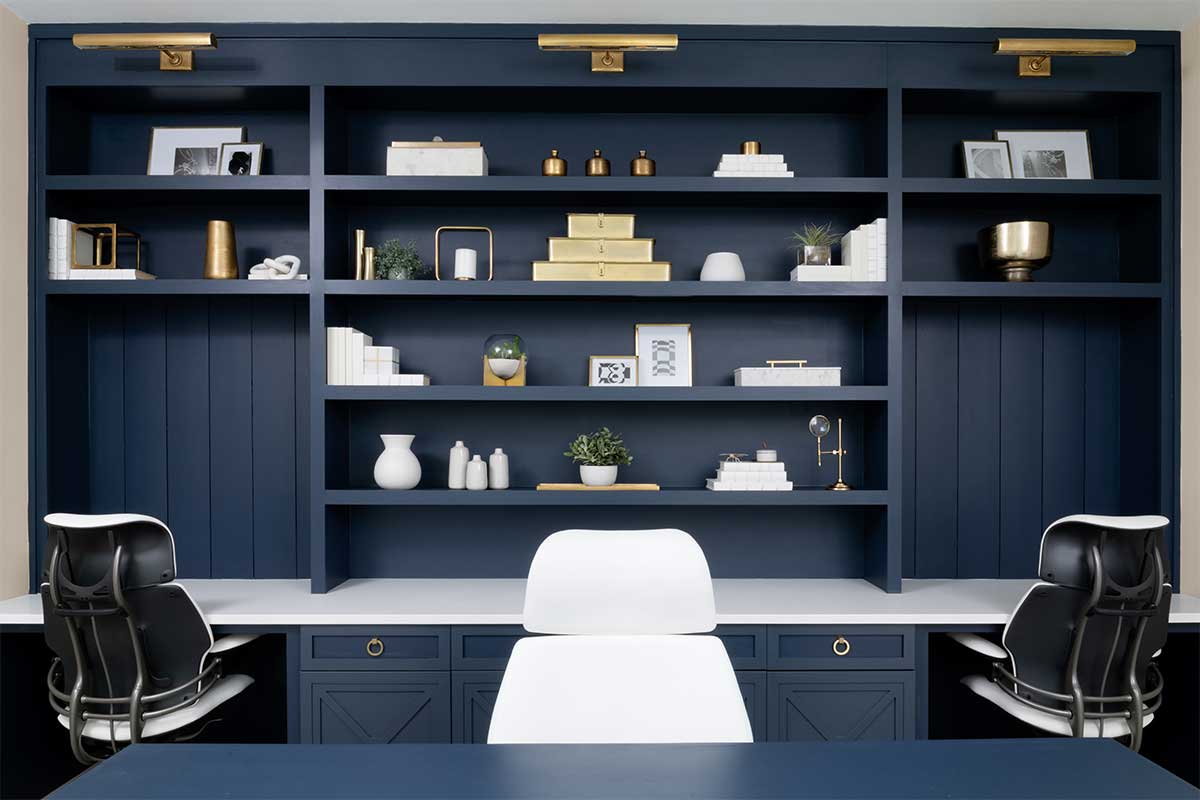 blue built ins behind desk