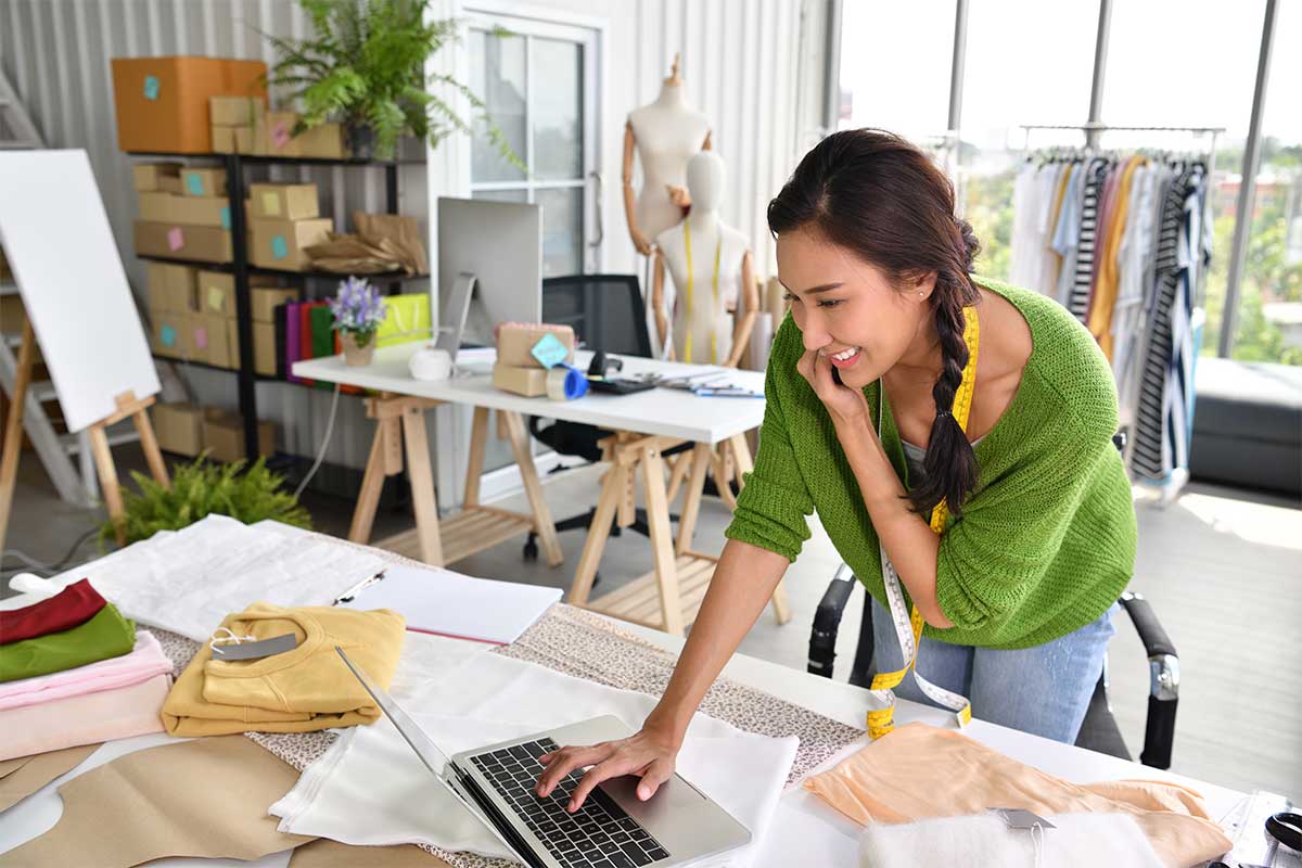 woman working on computer in studio