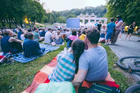 people watching outdoor movie