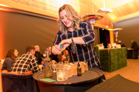 bartender serving whiskey