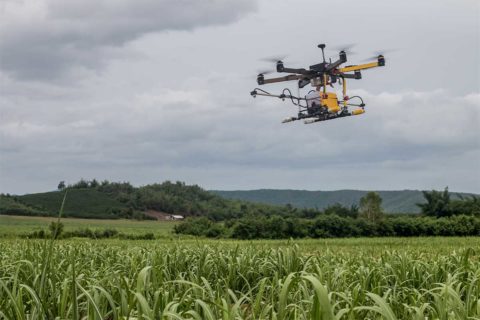 drone flying over farm