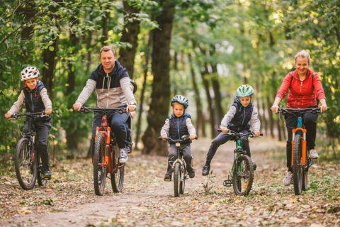 family riding bikes