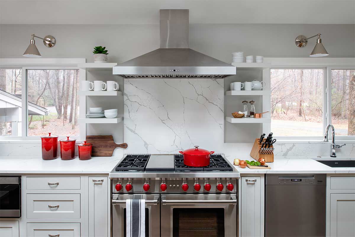 white kitchen with red accents